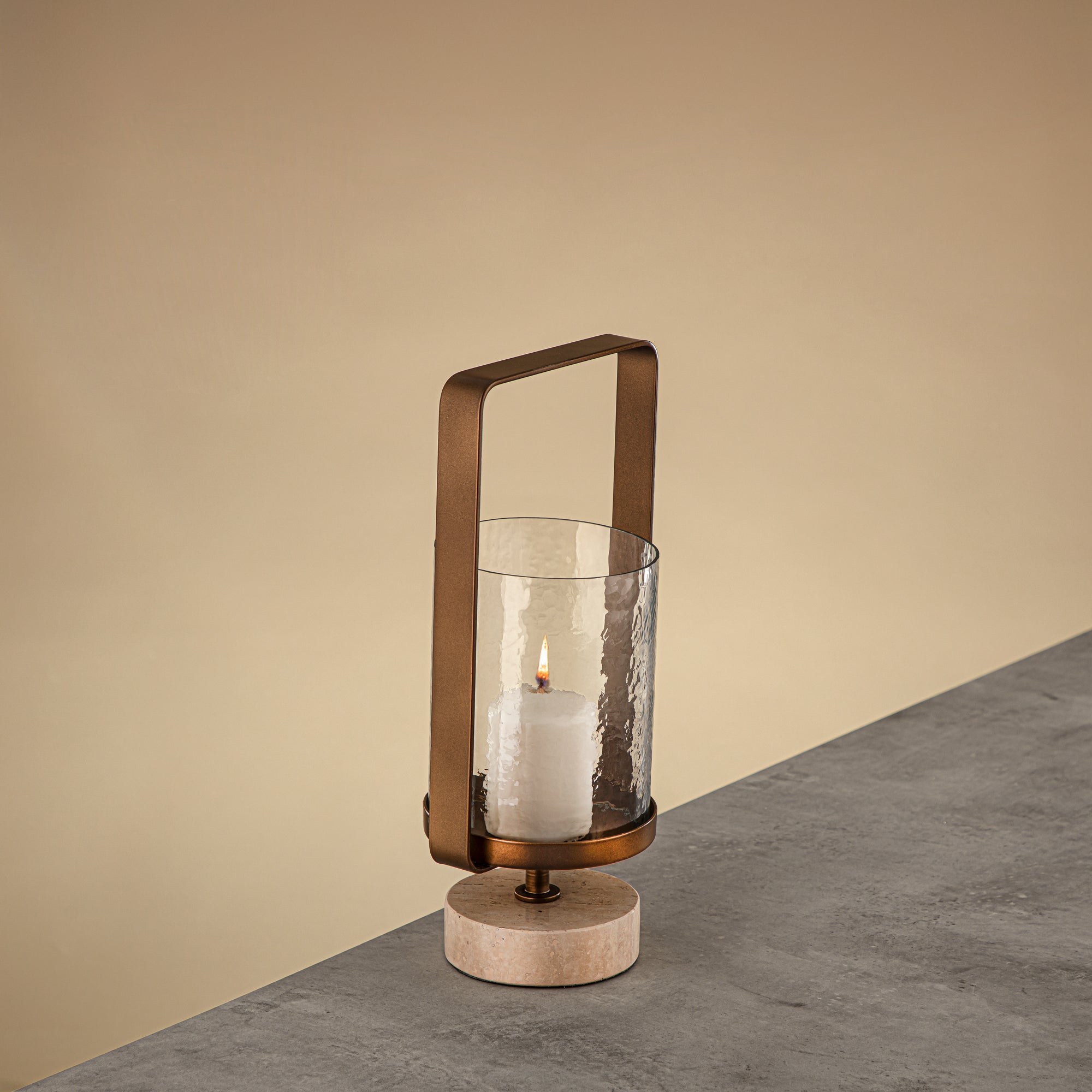 Almarjan Kalon Hurricane Lantern Hammered Clear Glass 15.5x12.5x32.5 CM Brushed Gold & Travertine Base (GMT2960025)